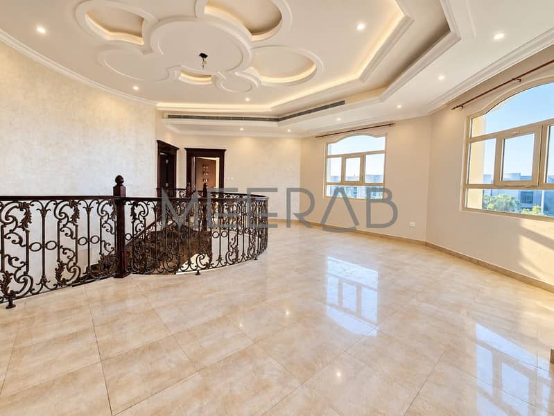 9 Bright Cream Mezzanine with Ornate Railing. png