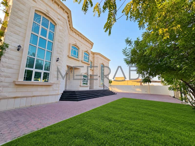14 Elegant Villa with Lush Green Lawn. png