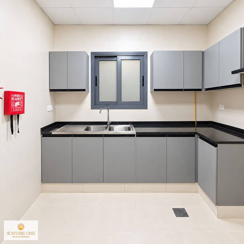13 Modern Utility Kitchen with Fire Safety Box. png