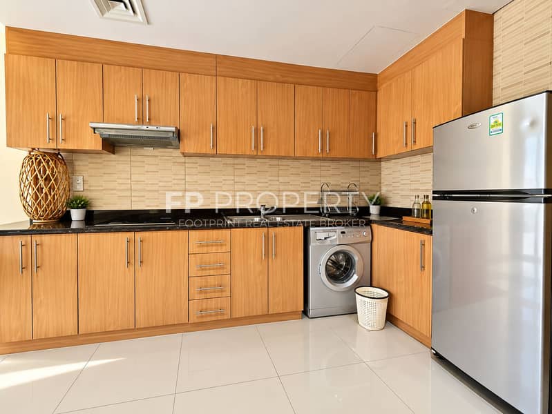 7 Warm Modern Kitchen with Stainless Appliances. png