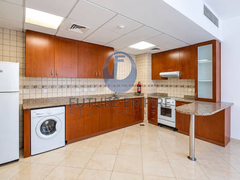 11 Bright Modern Cherry-Wood Kitchen. png