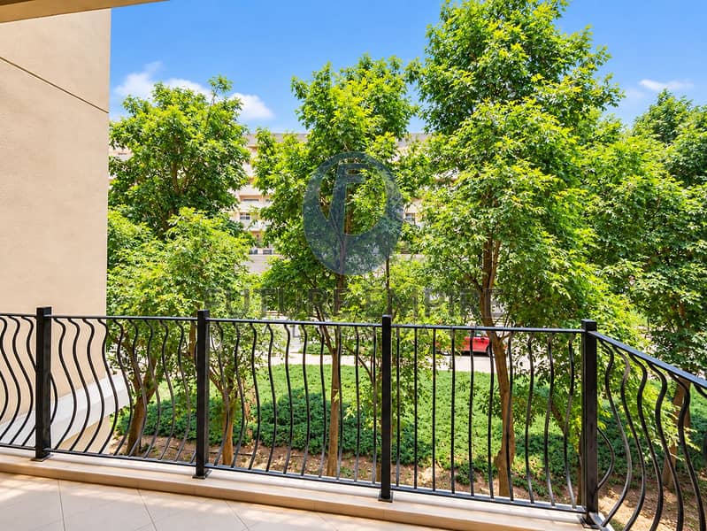 12 Sunny Balcony Overlooking Lush Trees. png