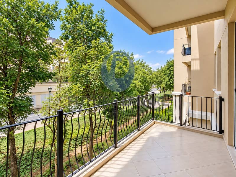 13 Sunny Balcony Overlooking a Leafy Courtyard. png
