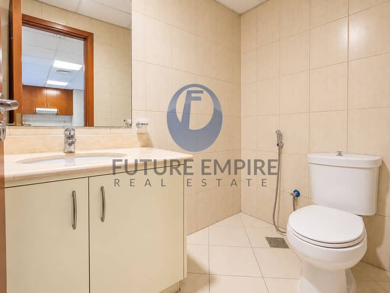 15 Modern Beige Bathroom with Kitchen Reflection. png