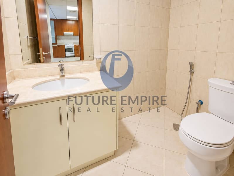 17 Modern Beige-Tiled Bathroom Interior. png