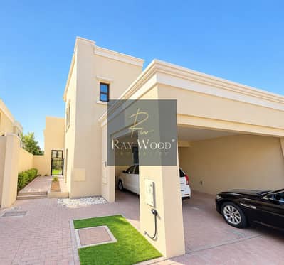 4 Bedroom Townhouse for Rent in Reem, Dubai - Sunlit Beige Villa Driveway and Garage. png