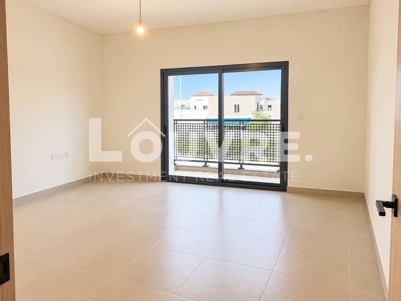 13 Bright Minimal Room with Balcony View. png