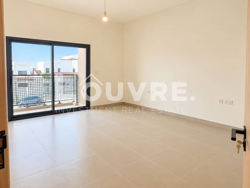 14 Bright Minimalist Room with Balcony View. png