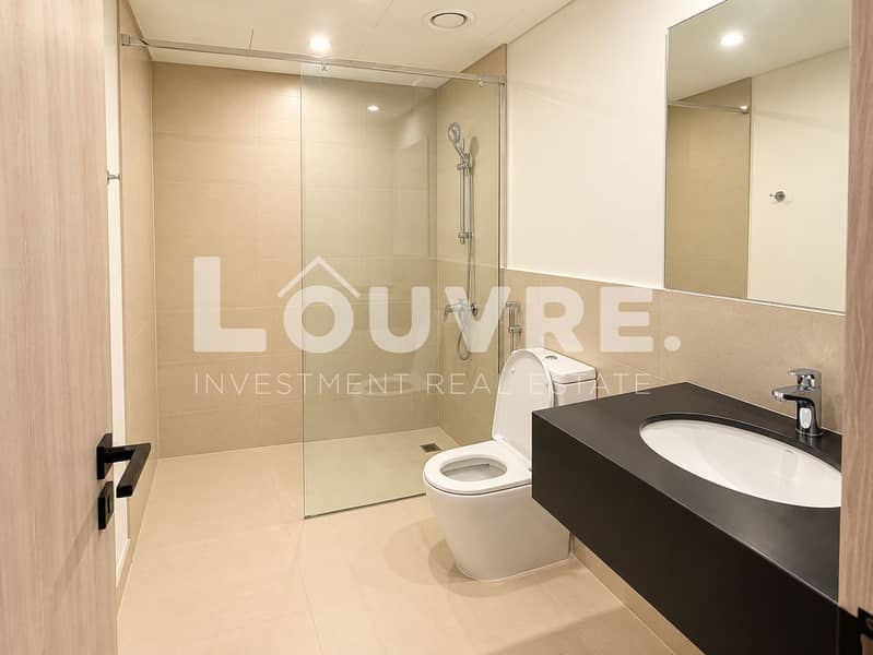 16 Modern Beige Minimalist Bathroom. png