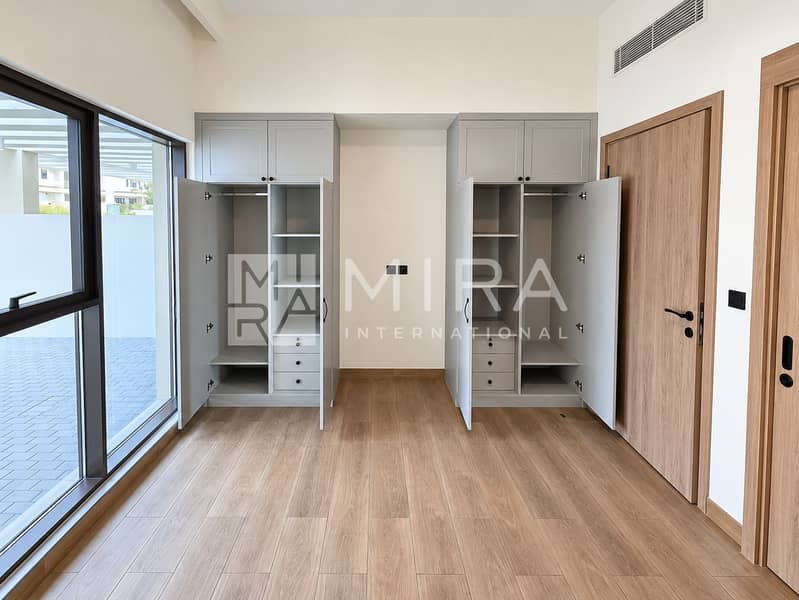 11 Bright bedroom with twin open wardrobes-8