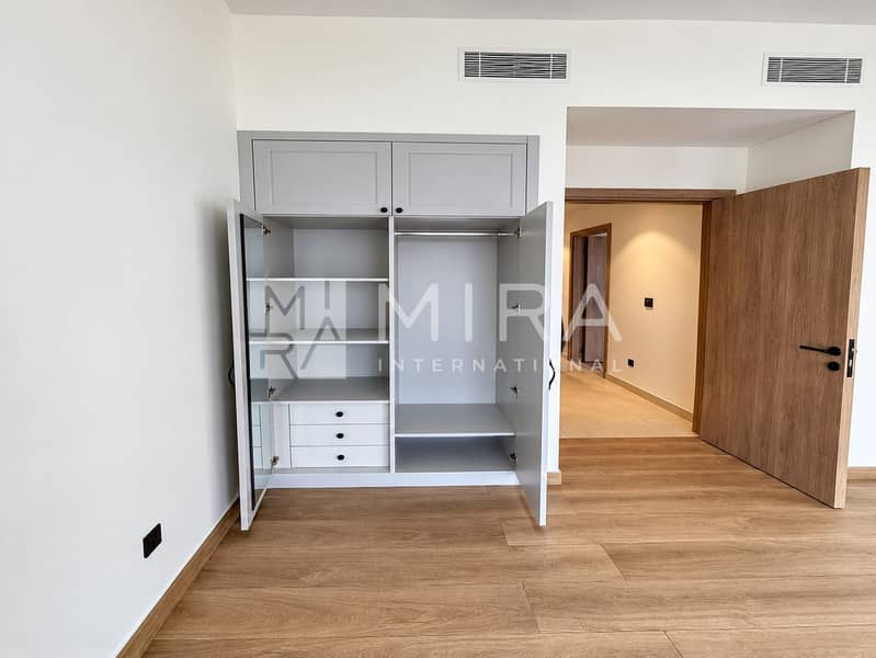 12 Clean Empty Bedroom with Open Wardrobe-9
