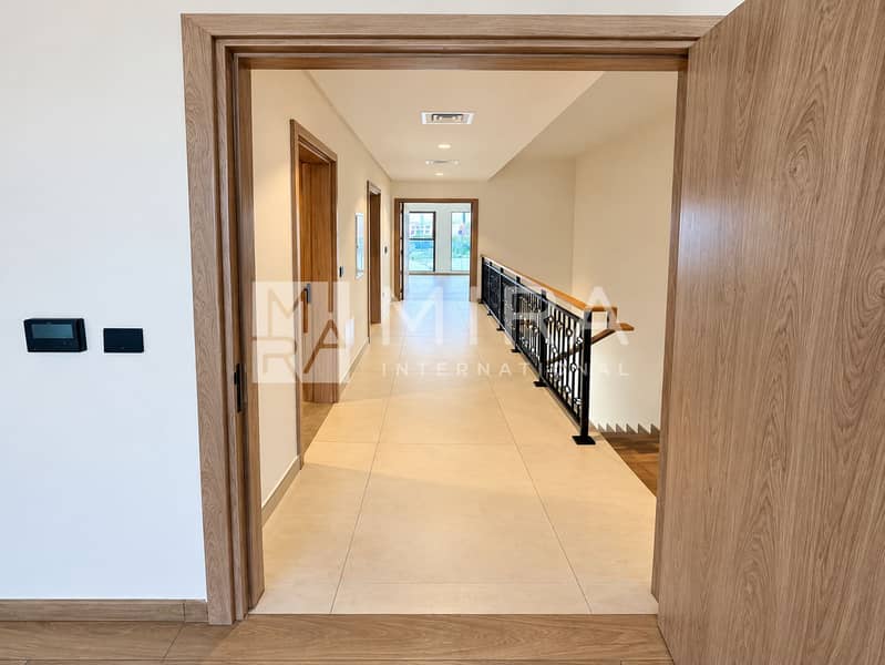 18 Bright Upstairs Hallway Through Open Door-7