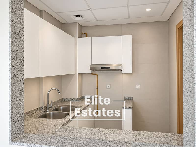 9 Minimal Modern Kitchen Through Granite Pass-Through. png