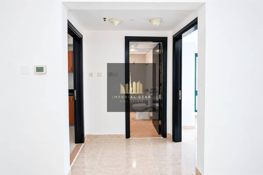 9 Bright Modern Hallway with Open Doorways. png