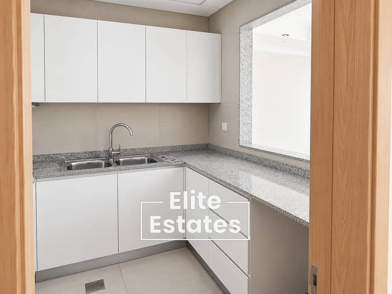 12 Minimal Modern Kitchen with Pass-Through Window. png