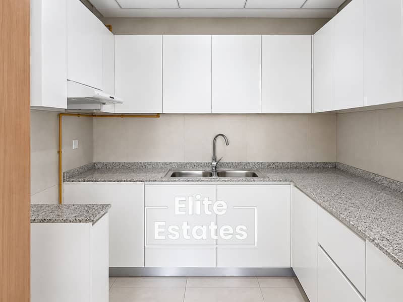 13 Minimalist White U-Shaped Kitchen. png