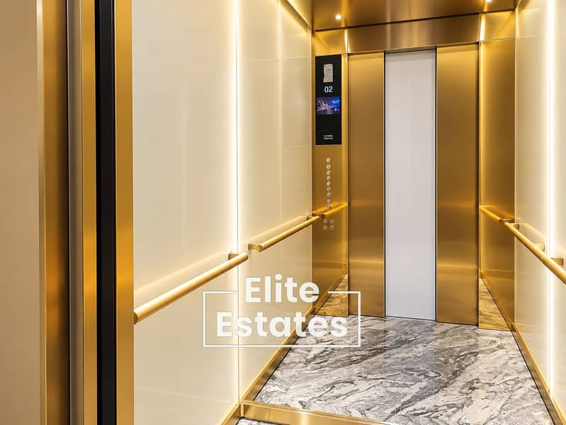 17 Luxurious Brass and Marble Elevator. png
