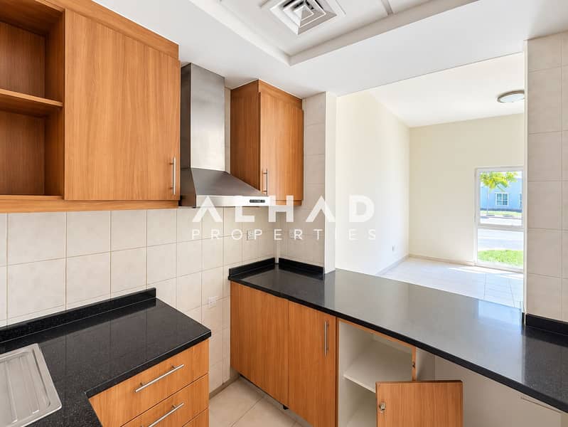 5 Bright Modern Kitchen with Garden View. png