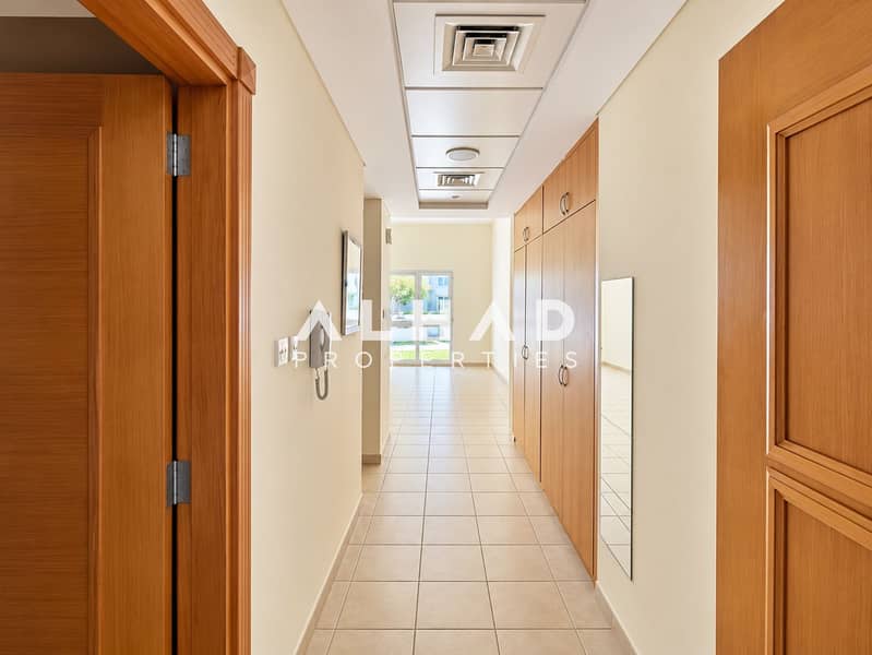9 Symmetrical Modern Hallway with Garden View. png