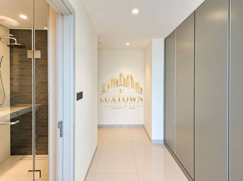 8 Modern Minimalist Hallway with Shower and Wardrobes. png