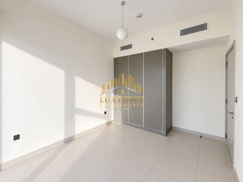 9 Sunlit Minimalist Room with Wardrobe. png