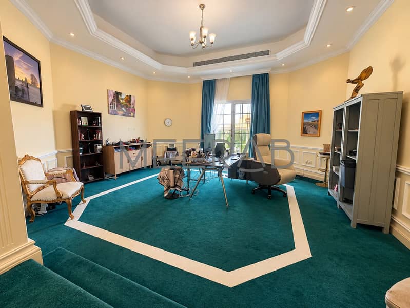 6 Elegant Teal-Carpeted Home Office. png