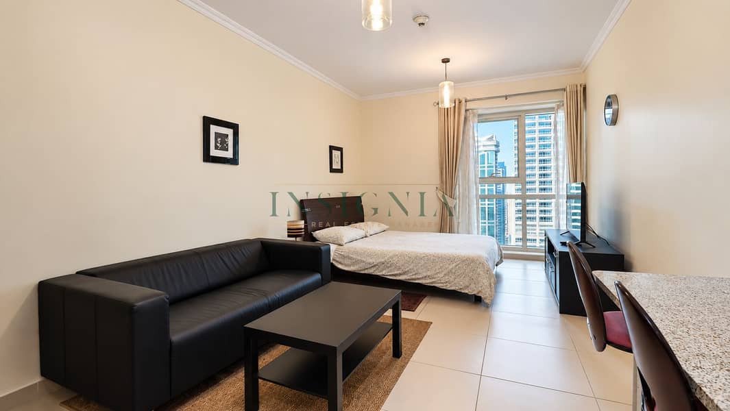 2 Modern Studio Apartment with City Skyline. png
