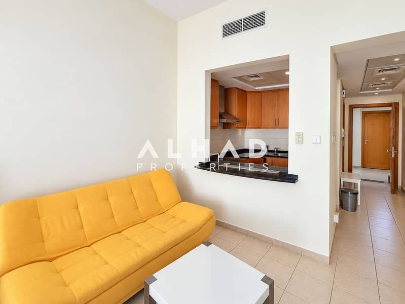 4 Modern Apartment with Mustard Sofa and Kitchen Pass-Through. png