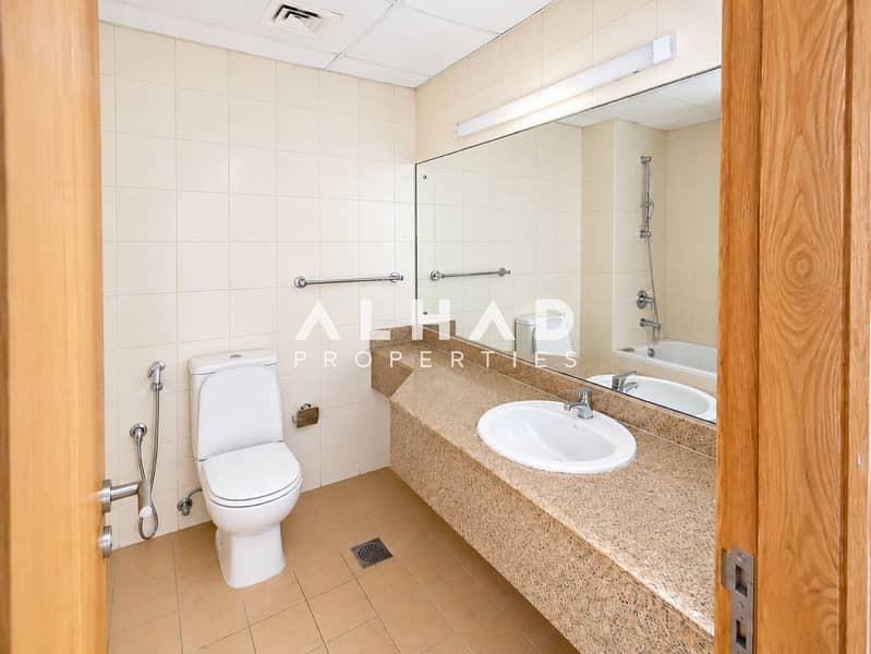 7 Bright Minimalist Beige Tile Bathroom. png