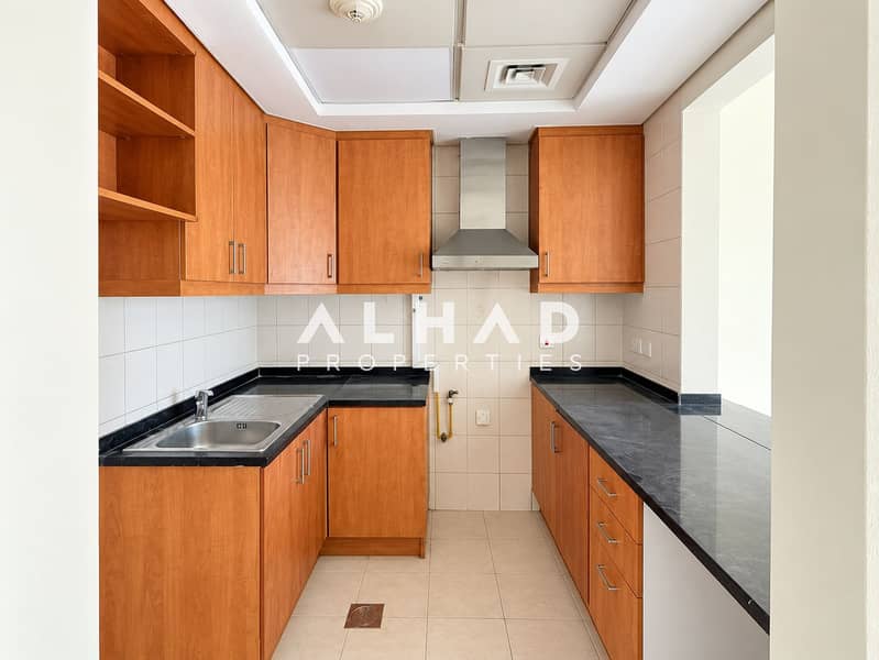 6 Warm Wood U-Shaped Kitchen (1). png