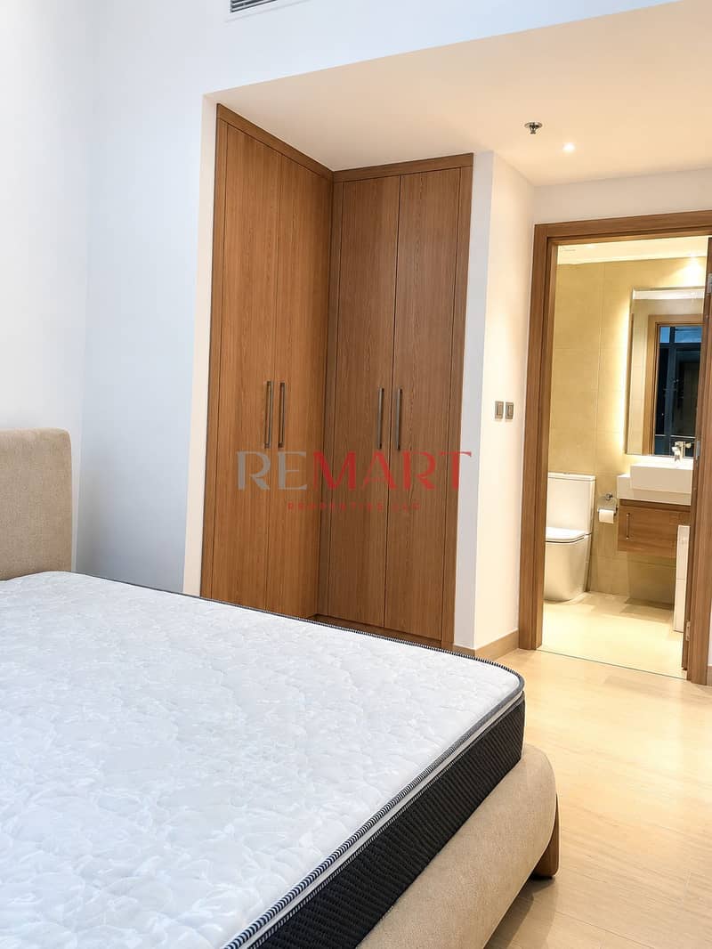 7 Modern Bedroom with Warm Wood Wardrobe (1). png