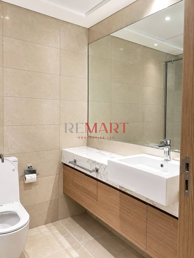 8 Modern Beige Marble Bathroom. png