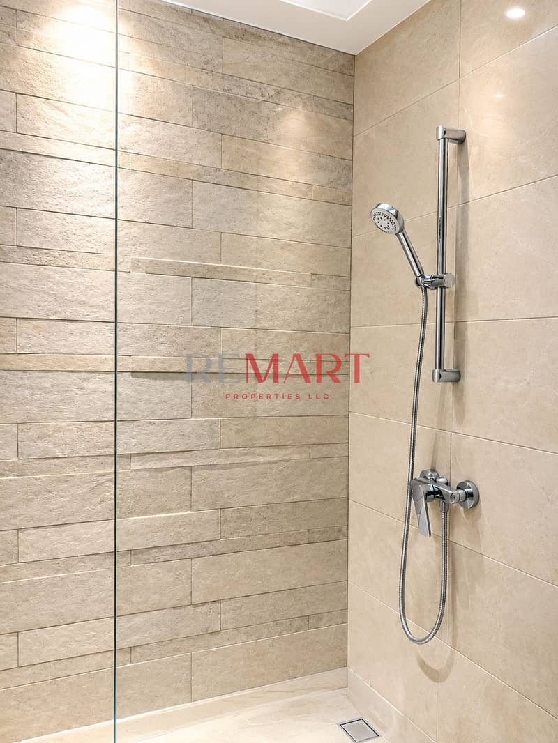 9 Modern Beige Stone Shower Enclosure. png