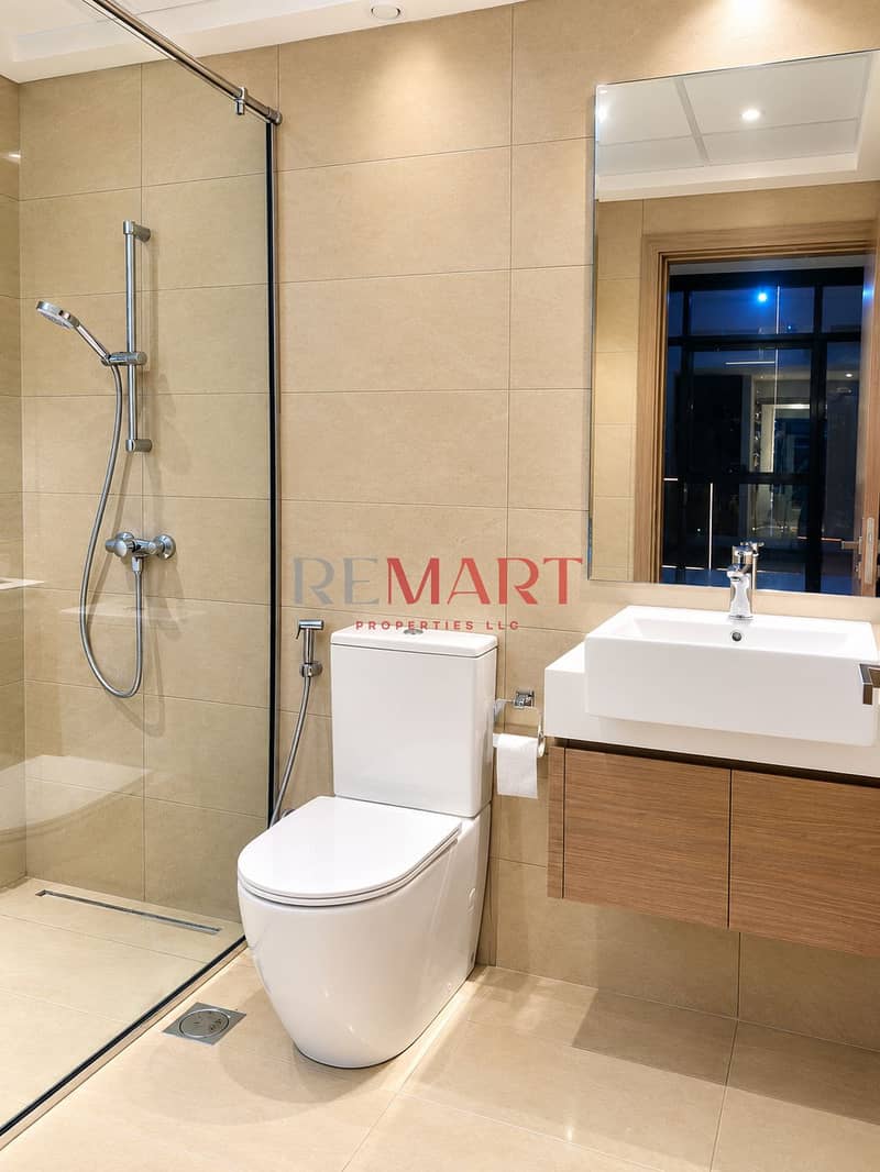 10 Modern Beige-Tiled Bathroom Interior (1). png