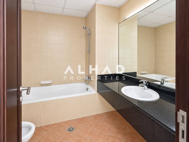 9 Modern Beige Tile Bathroom. png