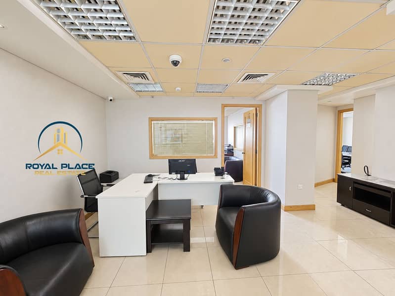 16 Naturally lit furnished office workspace (1). png
