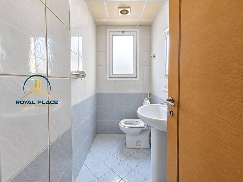 17 Brightened compact office washroom. png