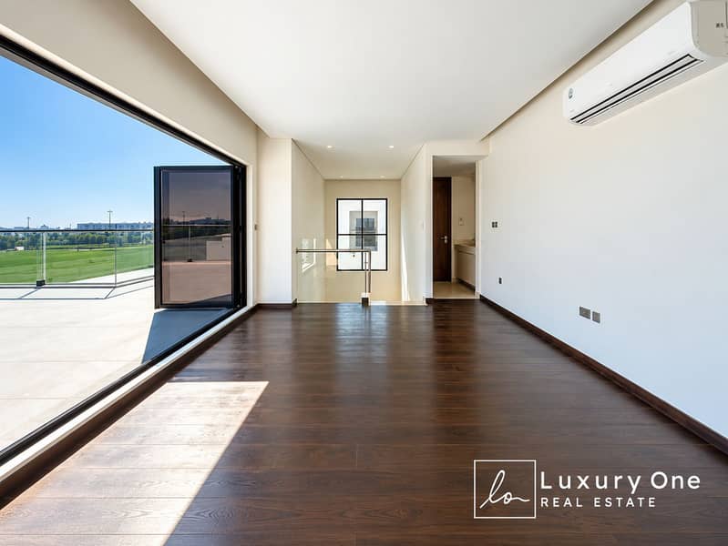 5 Sunlit Modern Room with Balcony View. png