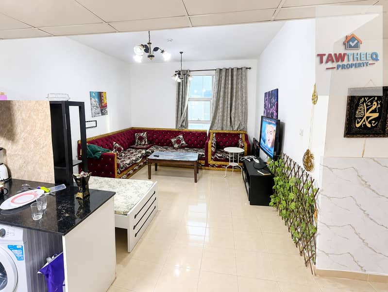 2 Bright Modern Living Room with Kitchenette. png