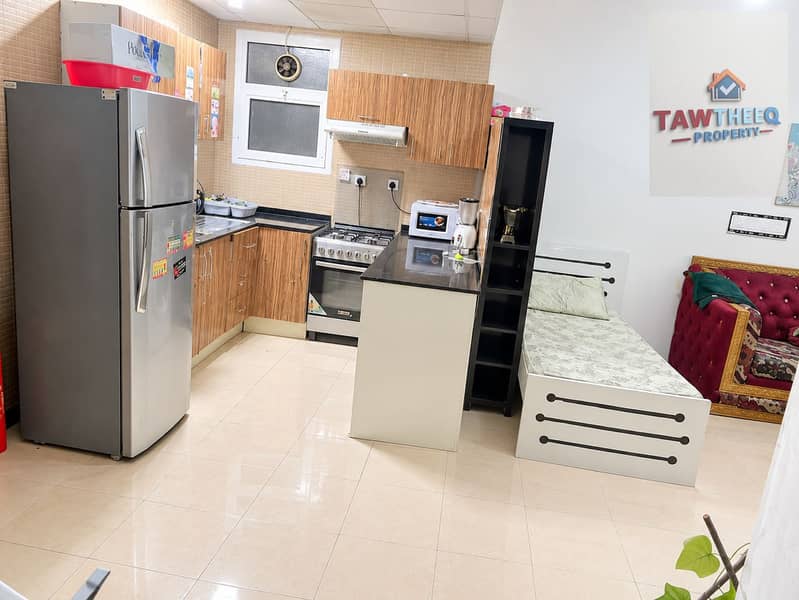 3 Bright Compact Kitchen and Cozy Living Space-2. png