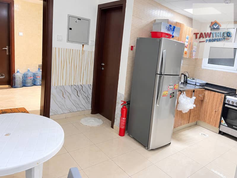 4 Bright Tiled Apartment Kitchen Interior. png