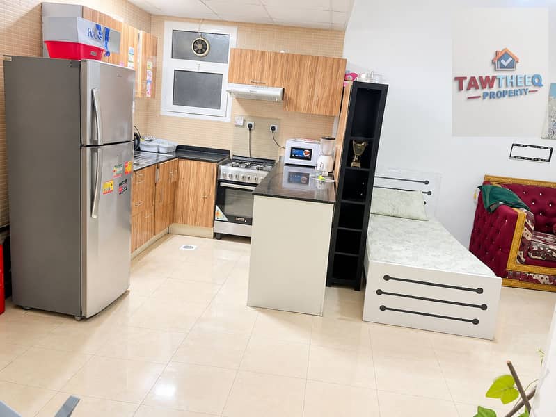5 Bright Compact Studio Kitchen-Living Area-1. png