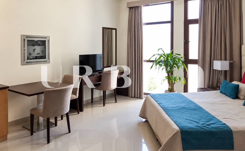 3 Modern Hotel Bedroom with Teal Accents (1). png