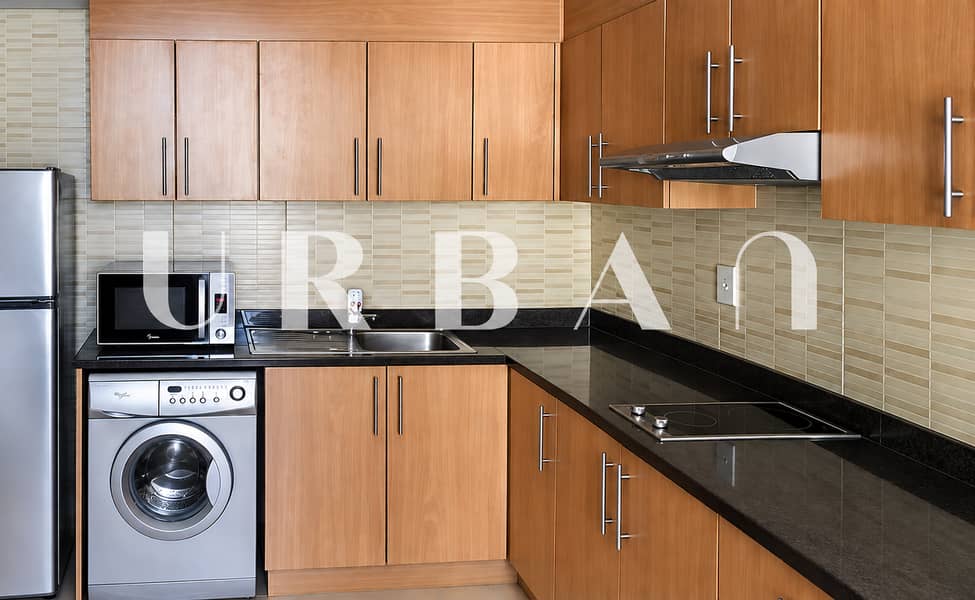 4 Modern Urban Kitchen with Stainless Appliances. png