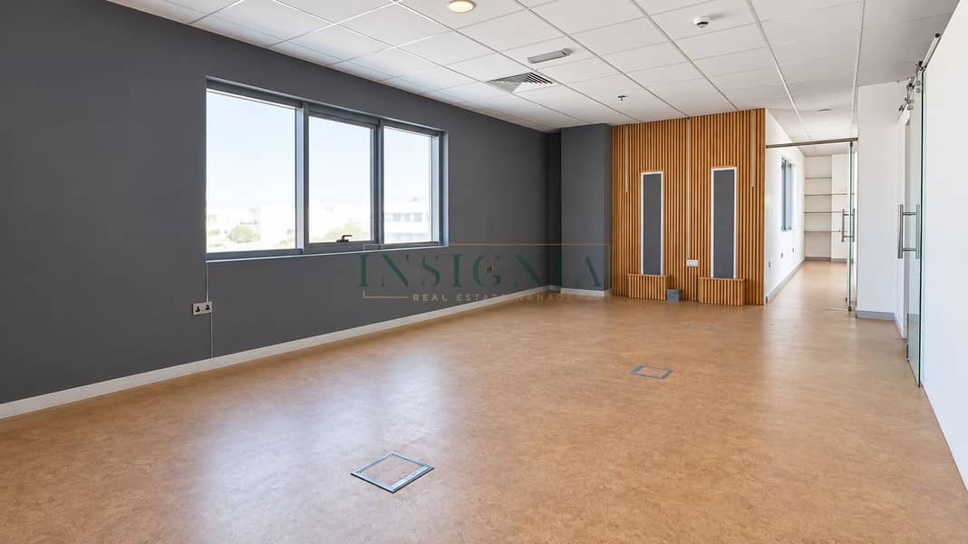 2 Bright Modern Office Interior with Wood Slats. png
