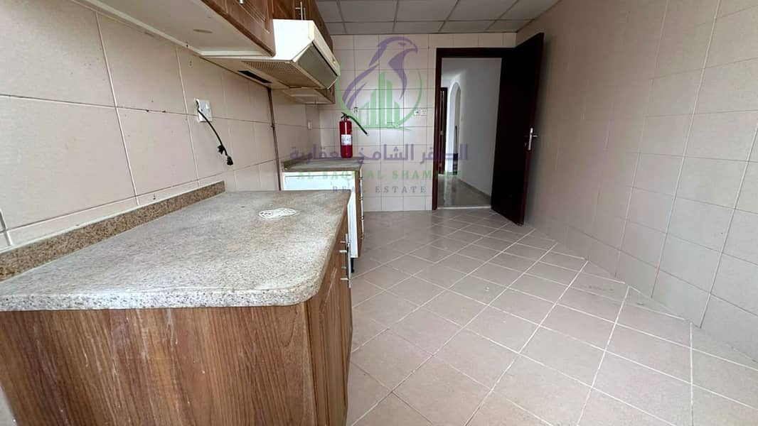 16 apartment-for-rent-2-bedroom-alkhan-alsharqh-kitchen-18. jpg