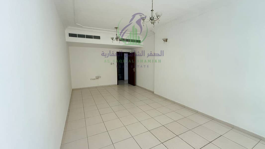10 apartment-for-rent-2-bedroom-altaawn-alsharqh-living-room-01. jpg