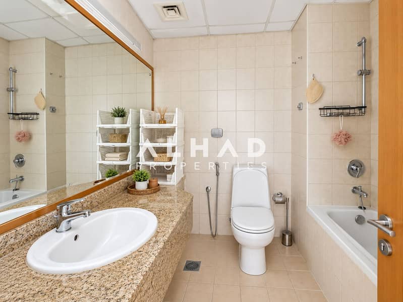 6 Modern Beige Bathroom with Organized Vanity. png