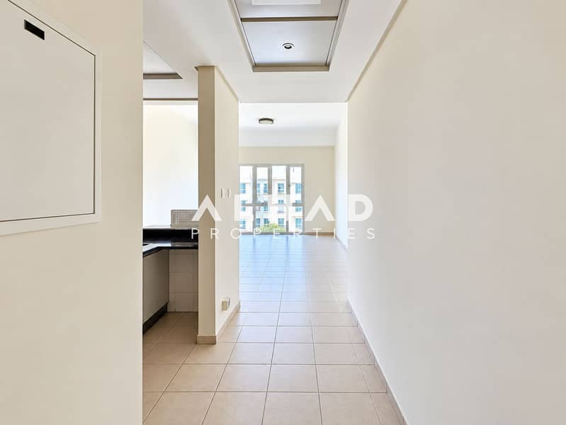 7 Bright Minimalist Apartment Corridor and Living Area. png