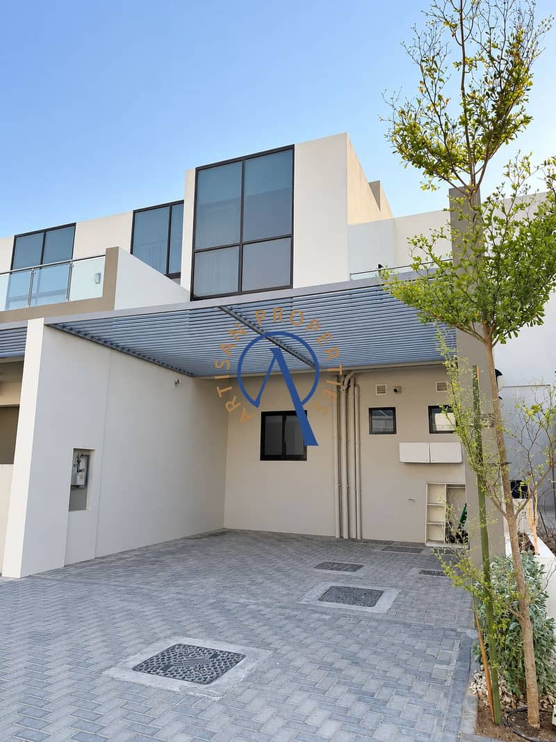 23 Contemporary Townhouse with Empty Driveway. png
